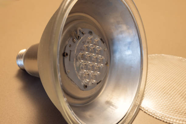 Halogen bulb is on the white table.