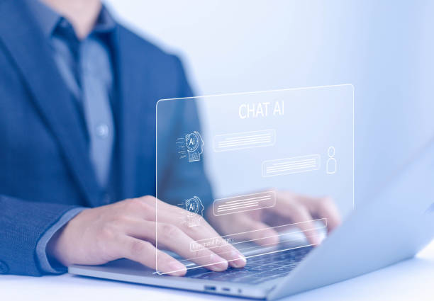 istock Businessman chatting with AI or artificial intelligence technology. A man uses a laptop computer to chat with an intelligent AI. 2180433057
