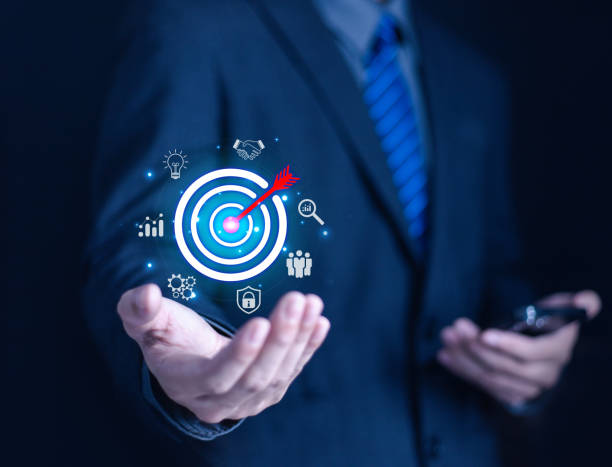 istock Business goal setting concept. Businessman holding virtual target icon for business purpose. Strategic planning for business growth. Marketing strategy and goal for success. 2180433079