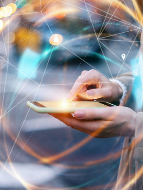istock Young woman with smartphone in her hands. Outdoors. Global networking concept 2180433506