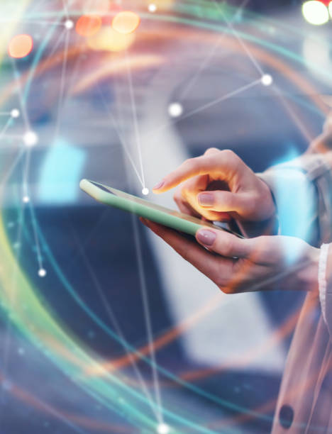 istock Young woman with smartphone in her hands. Outdoors. Global networking concept 2180433509