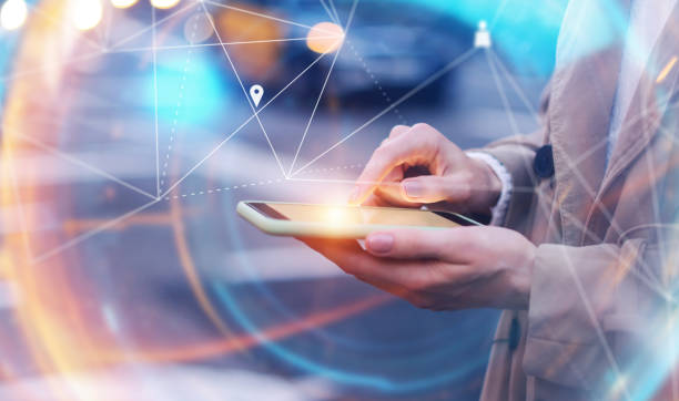 istock Young woman with smartphone in her hands. Outdoors. Global networking concept 2180433537