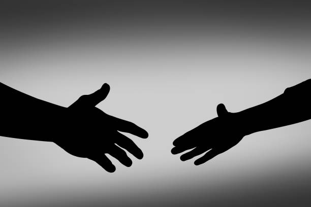 istock Partnership and trust. The power of a handshake 2180438869