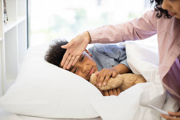 istock Caring for sick child with loving attention and comfort 2180439852