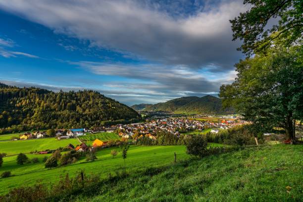 istock Vibrant Village in Lush Green Hills 2180442672