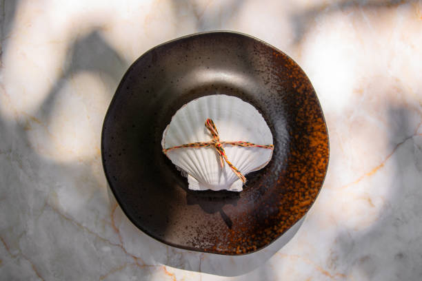 Fine dining restaurant Appetizer tasting menu with scallops mussles at elegant gourmet table plate