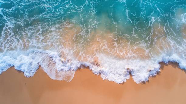 istock Aerial view of the beautiful sandy beach with waves 2180442946