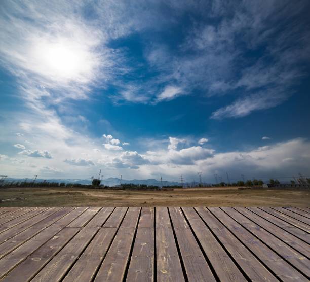 Blue sky and white clouds with wooden floor