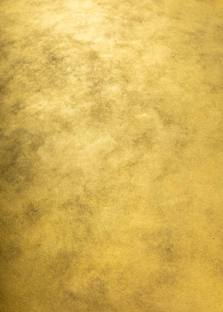 Light gold wall,  with copy space stock photo.  Background, abstract texture. Empty old wall. Golden shine