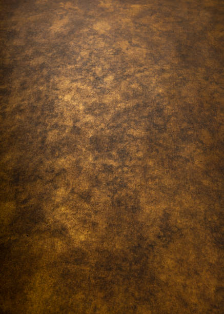 Dark brown, bronze wall,  with copy space stock photo.  Background, abstract texture. Empty old wall.  Big contrast, vertical photo