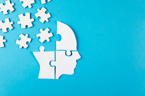 istock Paper Human Head with Puzzle Pieces 2180452374