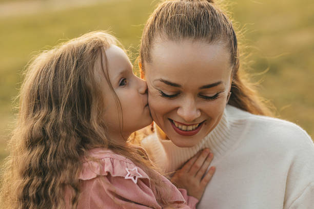 istock family evening in the park 2180454129