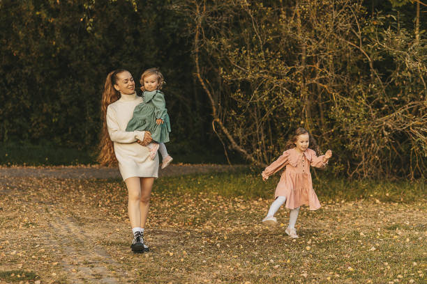 istock family evening in the park 2180454325