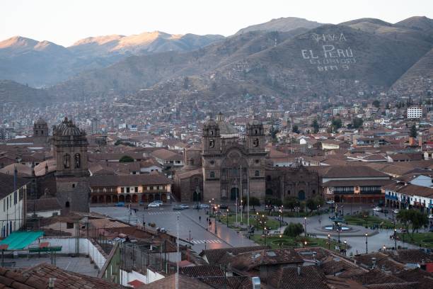 istock Scenic view of Cusco, Peru with historical architecture and mountain backdrop at sunset. 2180456117