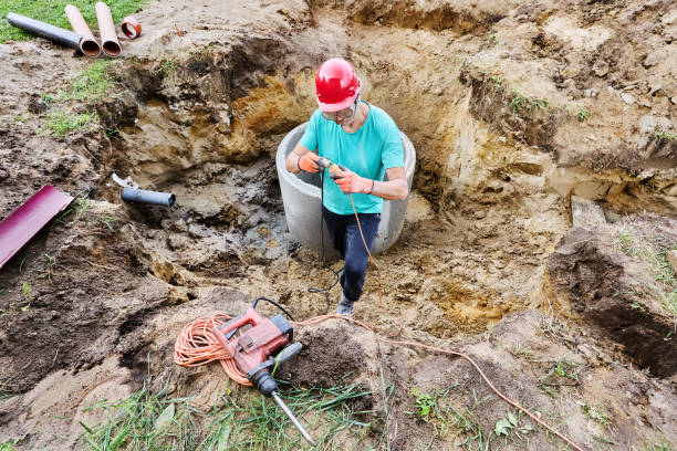istock Connecting hammer drill to power supply via an extension cable. 2180459471