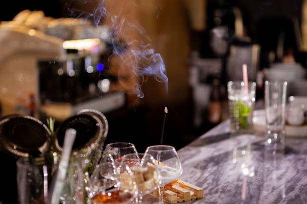 istock Aromatic smoke sticks on bar counter 2180460750