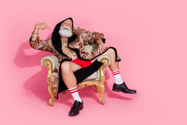 istock Full size photo of egocentric rich man sit throne point finger self empty space isolated on pink color background 2180461340