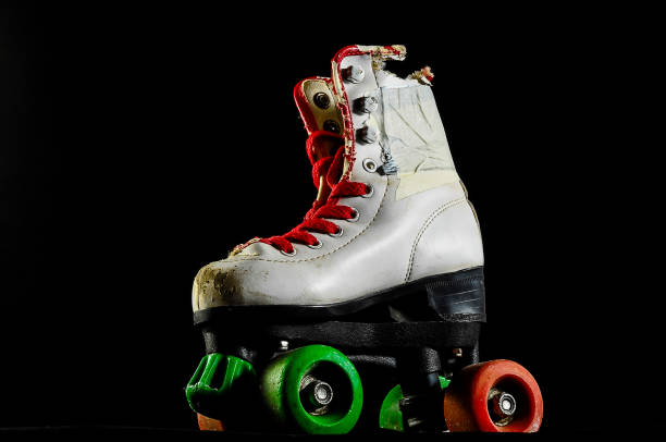 istock A pair of roller skates with green wheels and red laces 2180462059