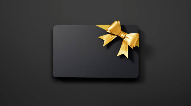 istock Black Gift Card with tied golden Bow 2180463686