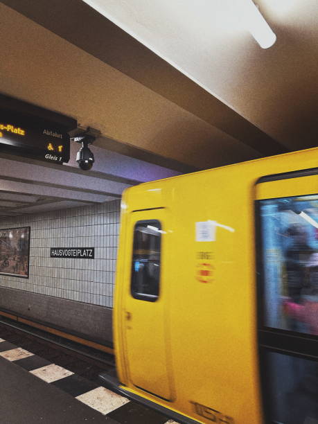 istock metro station in the evening with yellow carriages 2180464836