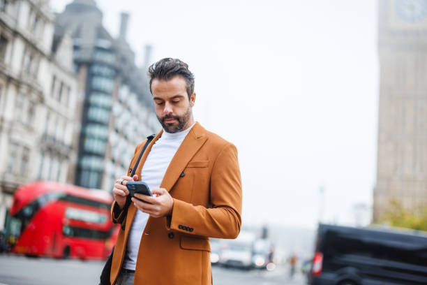 istock Man Exploring London with Big Ben in Background 2180472552