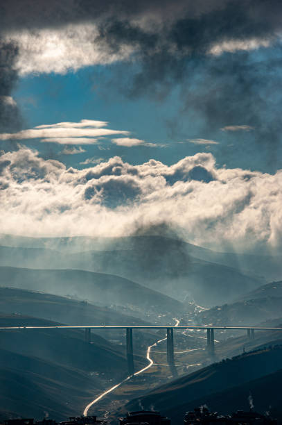 Millau, France - January 12, 2022: The Millau Viaduct is a multispan cable-stayed bridge completed in 2004 which crosses the gorge valley of the Tarn near Millau in the Aveyron department in the Occitanie Region in Southern France. As of September 2020, it is the tallest bridge in the world, having a structural height of 336.4 metres.