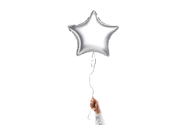 istock Hand holding blank silver star balloon mockup, isolated 2180475593