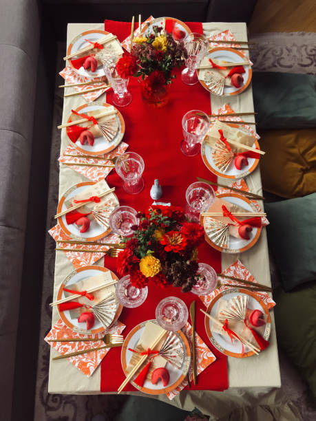 istock Chinese Festive Dining Table for 10 with Red and Yellow Accents, Vertical Flat Lay 2180476004