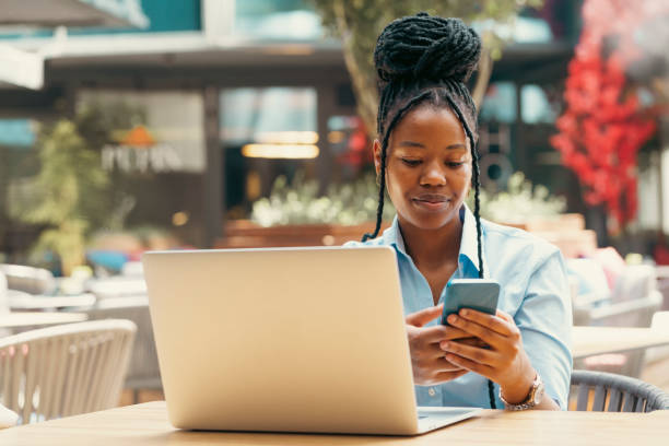 istock Young businesswoman working at a cafe 2180476686