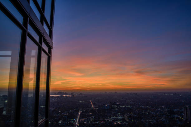 istock A citys sunset is reflected in the tall buildings windows 2180480098
