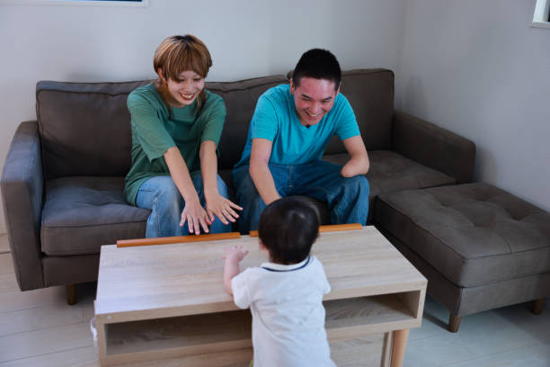 istock Family interacting baby at home 2180480239