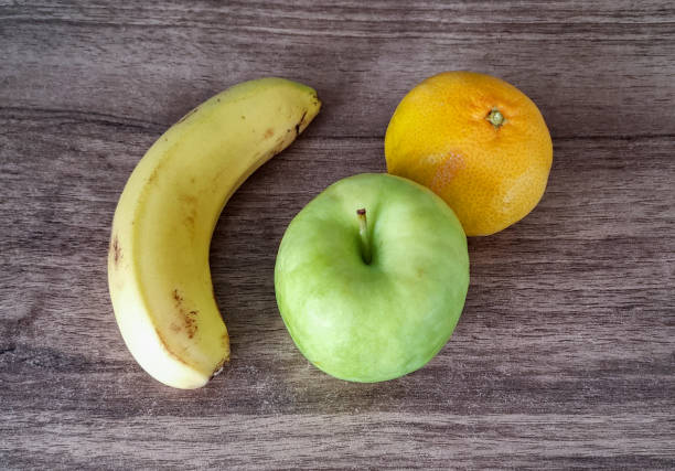 Fresh fruits on wooden table