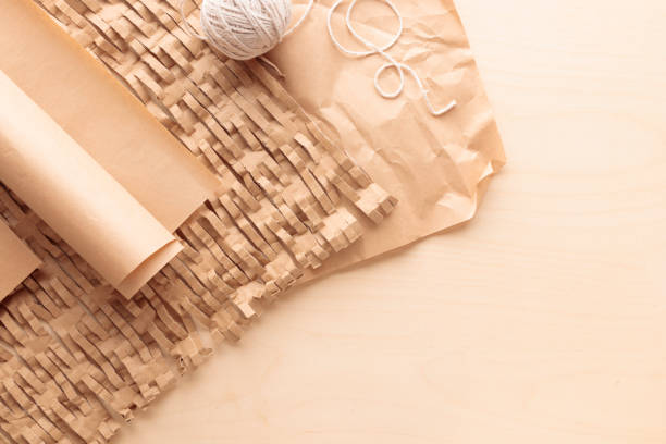 istock Eco-friendly packaging cushioning materials made of recycled paper for environmental protection, zero waste concept of sustainable consumption and environment protection 2180485427
