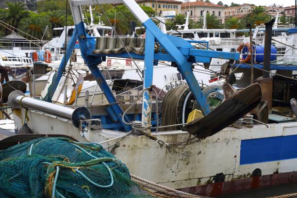istock Fishing boats/trawlers in dock 2180491667