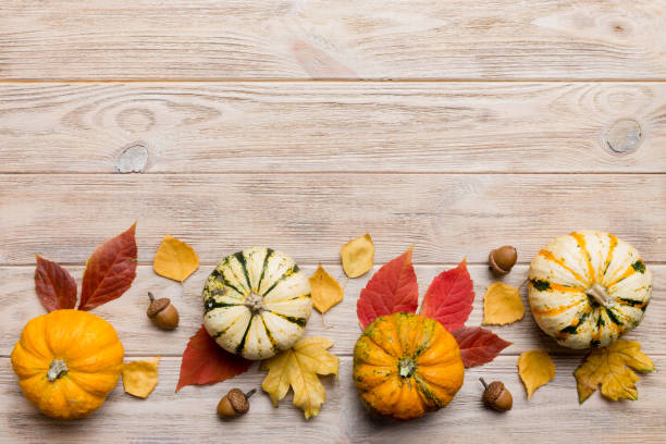 istock Autumn composition. Pattern made of dried leaves and other design accessories on table. Flat lay, top view 2180500160