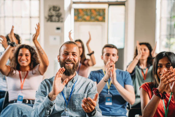 istock People are applauding during a conference 2180506985