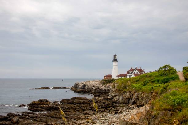 istock Portland Head Light on rocky shores 2180513861