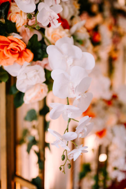 istock Beautiful artificial flowers arranged for wedding decor, adding elegance and color to the celebration 2180519274