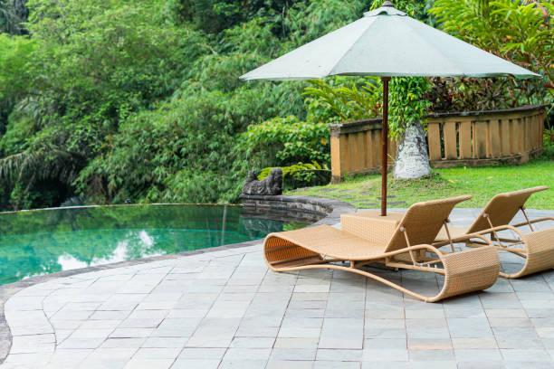 istock Lounge Chairs on a Scenic Patio 2180521508