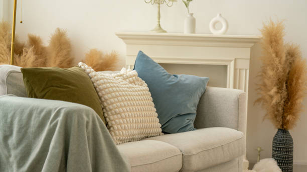 istock cozy sofa with pillow in living room. 2180529496