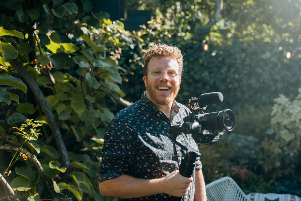 istock real estate agent Doing Video Work For Home Listing 2180531214