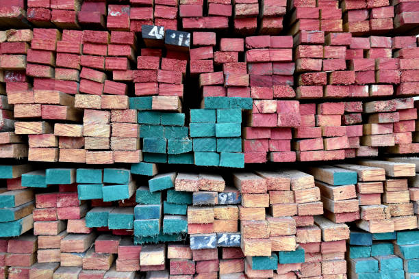 istock stack of colorful painted for classify types of wood stored in warehouse 2180533154