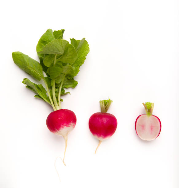 istock Radish with and without leaves, and root cut in half 2180533897
