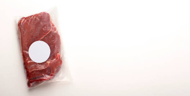 Raw meat in packaging with free label