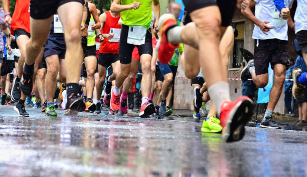 istock Marathon Running Race on a Rainy Day 2180535239
