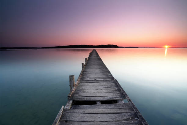 istock wooden pier over the sea 2180535509