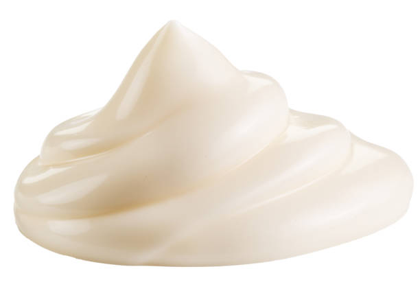 istock Squeezed mayonnaise pile on white background closeup. File contains clipping path. 2180541438