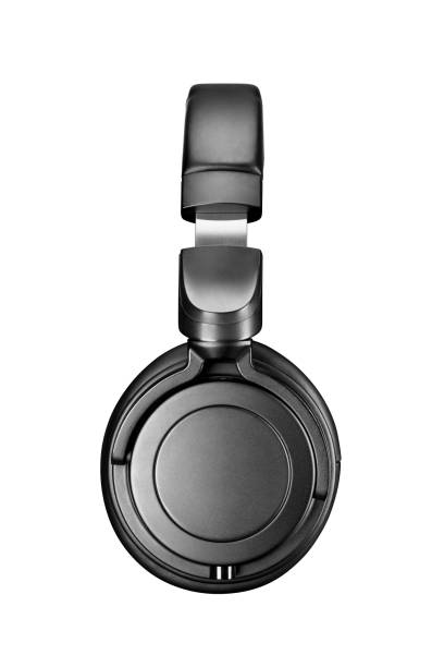 Modern black over-ear headphones isolated on white background.