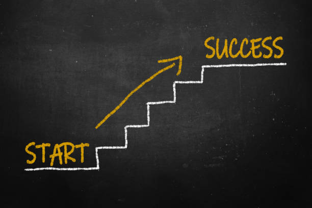 Business strategies and goals or New Year and Merry Christmas written on a school chalkboard or blackboard.