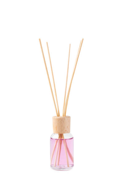 istock Aroma diffuser isolated on white background. Air freshener with rose scent on white background. Perfume bottle with scented sticks. mockup. 2180546473